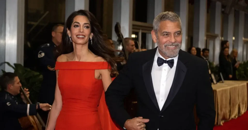 George Clooney is lying about his crumbling marriage to Amal, a body language expert has claimed. SOURCE: MEGA